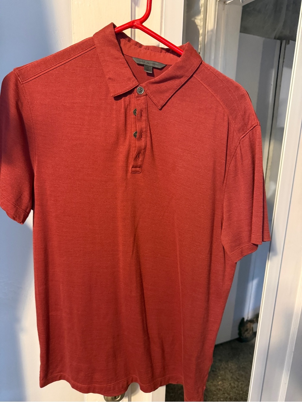 Men’s Varvatos polo in cool brick red color.